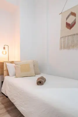 Cama o camas de una habitación en Home2Book Charming Design Apt Las Canteras Beach