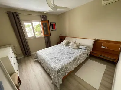 Cama o camas de una habitación en Apartamento Puerto Rico - Primera línea de playa