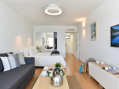 Cama o camas de una habitación en Nice apartment with balcony
