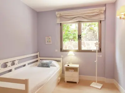 Cama o camas de una habitación en Belvilla by OYO Vibrant Villa with Swimming Pool