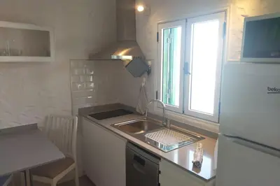 Una cocina o zona de cocina en Las Tartanas 110-1-2