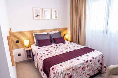 Cama o camas de una habitación en Susa Cosi Canteras Apartment
