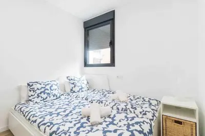 Cama o camas de una habitación en Arrecife Canteras Apartment