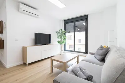 Una televisión o centro de entretenimiento en Arrecife Canteras Apartment