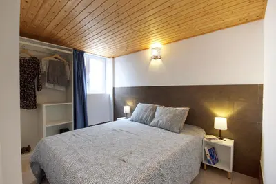 Cama o camas de una habitación en Fuche 11 Apartamentos a 10 minutos del Aeropuerto