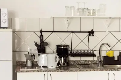 Una cocina o zona de cocina en Fuche 11 Apartamentos a 10 minutos del Aeropuerto