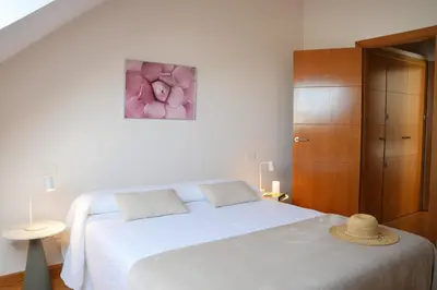 Cama o camas de una habitación en Sunny Home Canteras Beach