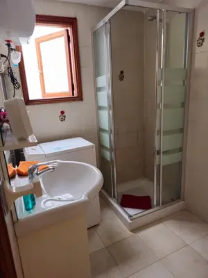 Un baño de Apartamentos Viviendas vacacionales Isabel Maria