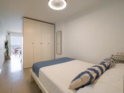 Cama o camas de una habitación en Apartamento Primera línea playa