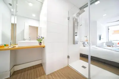 Un baño de Estudio con terraza vista mar