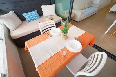 Zona de estar de Estudio con terraza vista mar