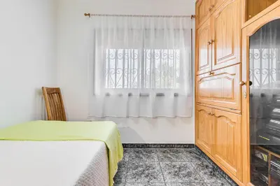 Cama o camas de una habitación en Raíces Vivas Vivienda Vacacional