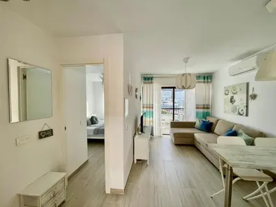 Cama o camas de una habitación en Blue Harmony Apartment