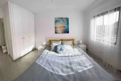 Cama o camas de una habitación en Blue Harmony Apartment