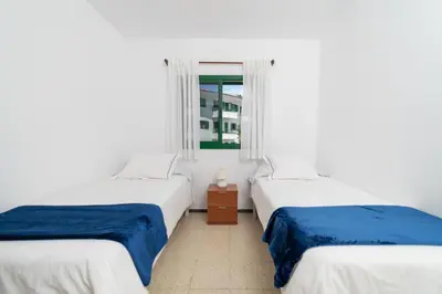 Cama o camas de una habitación en Dunas y Olas