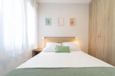 Cama o camas de una habitación en Venegas Urban Suites By Bevacacional