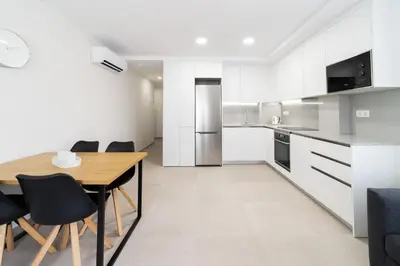 Una cocina o zona de cocina en Venegas Urban Suites By Bevacacional