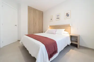 Cama o camas de una habitación en Venegas Urban Suites By Bevacacional