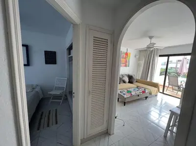 Cama o camas de una habitación en Vacaciones al sol San Agustin con piscina y WIFI