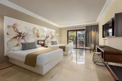 Cama o camas de una habitación en Unique Club at Lopesan Costa Meloneras Resort
