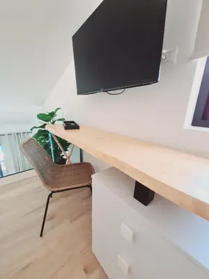 Una televisión o centro de entretenimiento en INFINITY VIEW