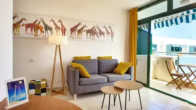 Zona de estar de La Girafe de las Dunas Solymar