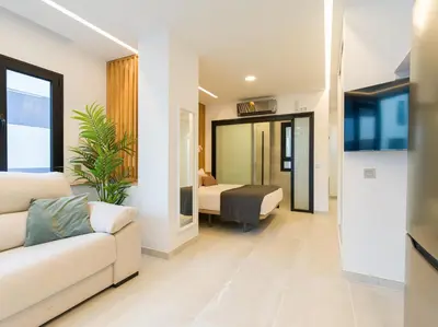 Una televisión o centro de entretenimiento en Arenisca Beach Home By CanariasGetaway