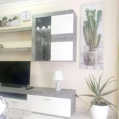 Una televisión o centro de entretenimiento en Las Olas apartamentos