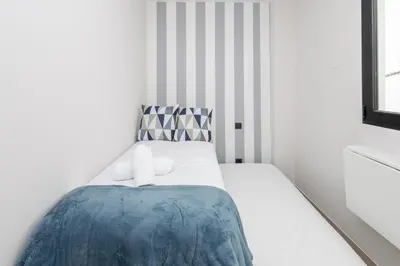 Cama o camas de una habitación en 2BR New Pretty Home next to Las Canteras Beach