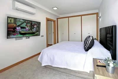 Una televisión o centro de entretenimiento en Salobre Vista Golf 8