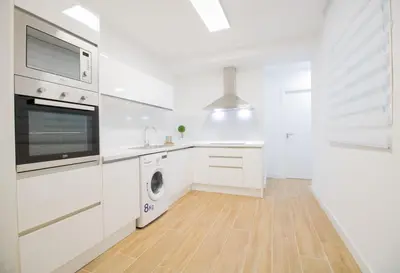 Una cocina o zona de cocina en Las Palmas Smart Rooms