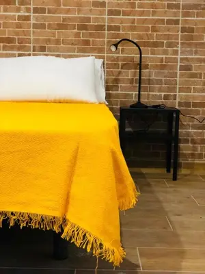 Cama o camas de una habitación en Nomad Apartments Gran Canaria