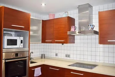 Una cocina o zona de cocina en La Puntilla Deluxe Apartment