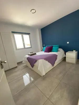 Cama o camas de una habitación en Vistas Mar Playa Las Canteras primera línea Wifi