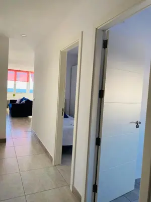 Cama o camas de una habitación en Vistas Mar Playa Las Canteras primera línea Wifi
