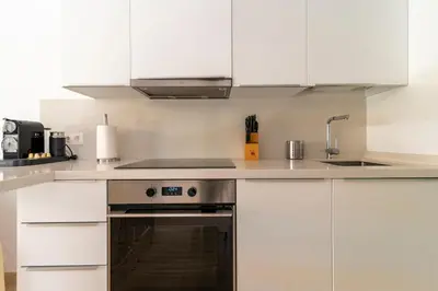Una cocina o zona de cocina en Apartamento junto a la playa