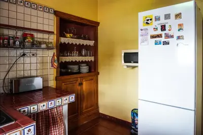 Una cocina o zona de cocina en Casa Yeyo, Lomo Bermejo