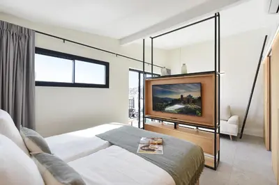 Cama o camas de una habitación en Los Canarios 630 by VillaGranCanaria