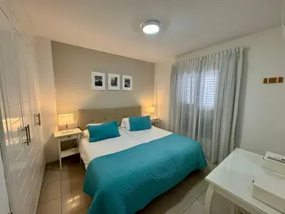 Cama o camas de una habitación en COSTA AZUL APARTMENTS - 2A