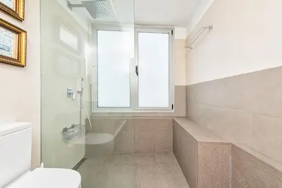 Un baño de Luxury First Line Apartment.