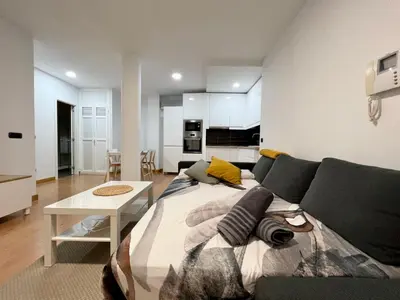 Una televisión o centro de entretenimiento en Sea lover Home