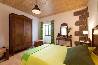 Cama o camas de una habitación en Villa Canaria piscina jacuzzi jardín