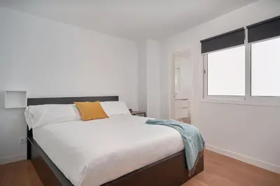Cama o camas de una habitación en Mary Sánchez Beach Apartments