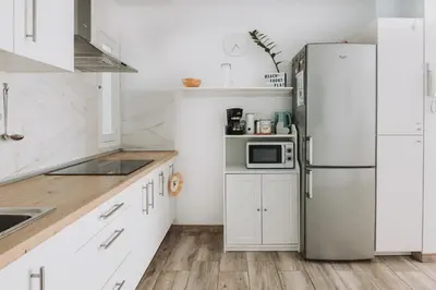 Una cocina o zona de cocina en Beachfront Apartment incl highspeed WIFI