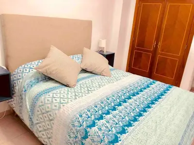 Cama o camas de una habitación en Casa playa Las Canteras