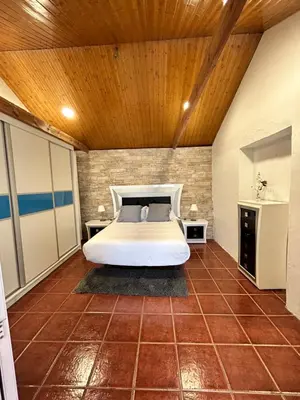 Cama o camas de una habitación en Casa Rural en Valsequillo