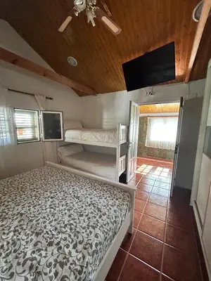 Cama o camas de una habitación en Casa Rural en Valsequillo