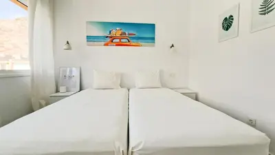 Cama o camas de una habitación en Amazing cozy Villa Hugo Tauro with Jacuzzi, Pool, Wi-Fi