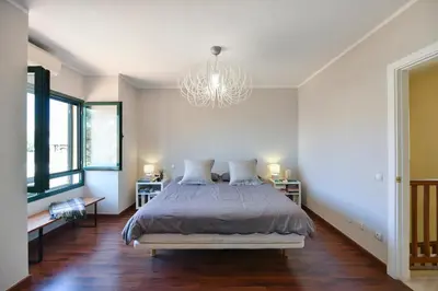 Cama o camas de una habitación en Los Tinos II 34 by VillaGranCanaria