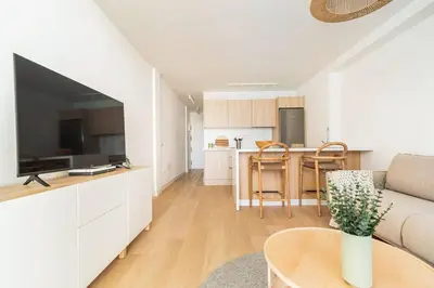 Una televisión o centro de entretenimiento en Apartamento de lujo - Zona Yumbo - Playa del Ingles